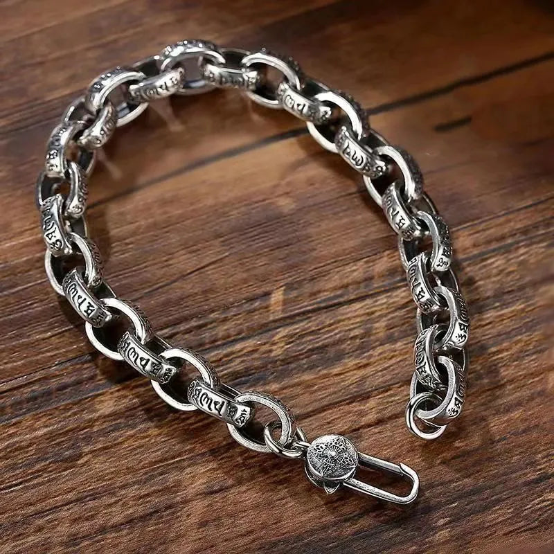 Detailed view of the Sacred Mantra Link Bracelet highlighting polished 925 sterling silver craftsmanship and secure clasp.