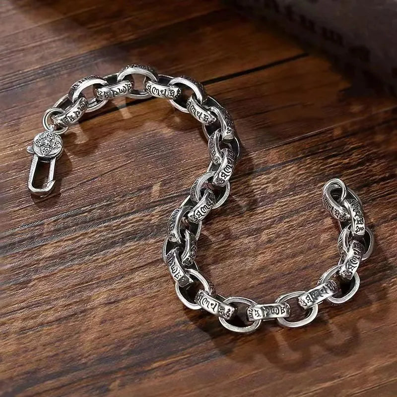 Close-up of the Men's Bracelet Silver featuring vintage-inspired engraved round links in authentic 925 sterling silver.