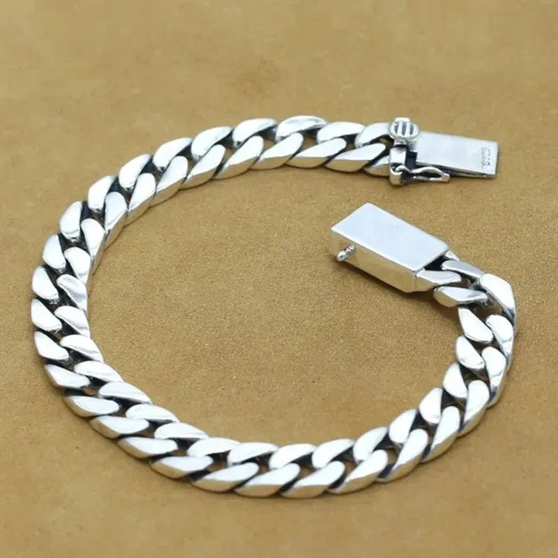 Bold Cuban link bracelet in solid sterling silver perfect for everyday elegance.