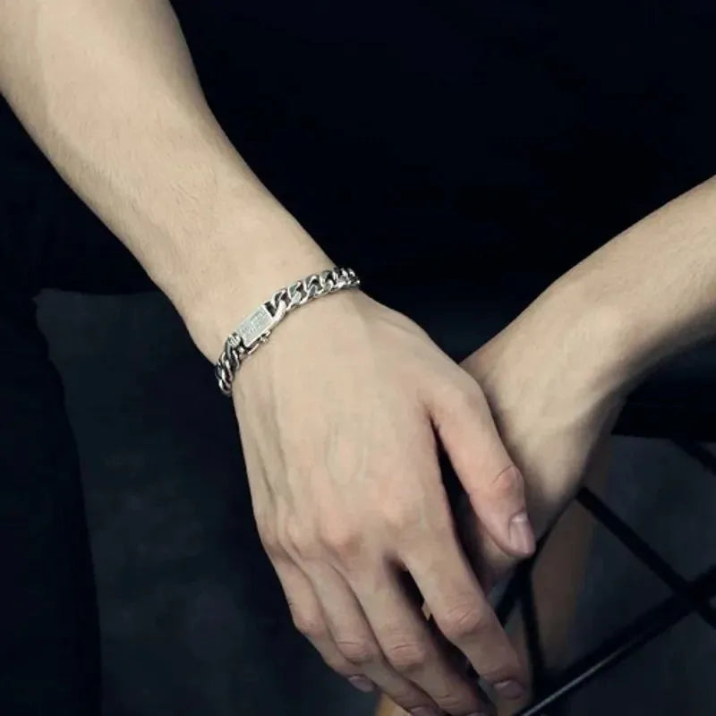 Men's Bracelet Silver with a bold Cuban link design and polished mirror finish.