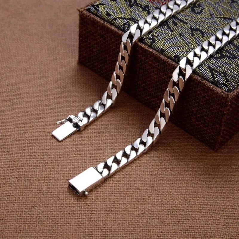 Heavy sterling silver Cuban bracelet featuring a sleek polished finish and secure clasp.