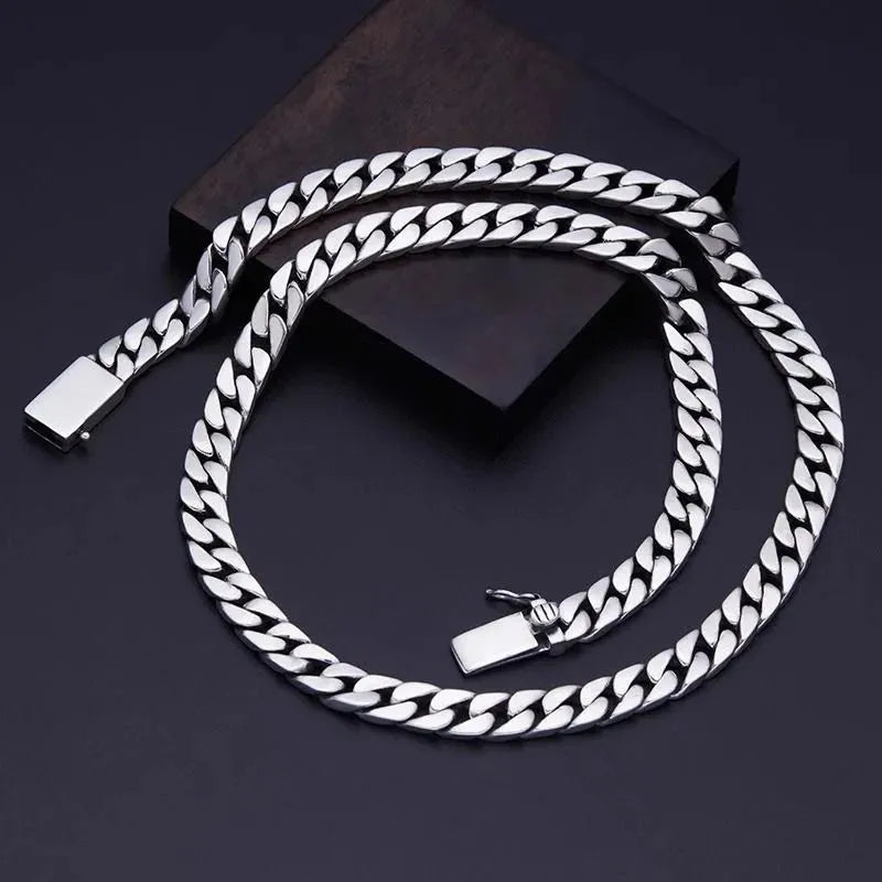 925 sterling silver Cuban bracelet with polished links and modern masculine styling.