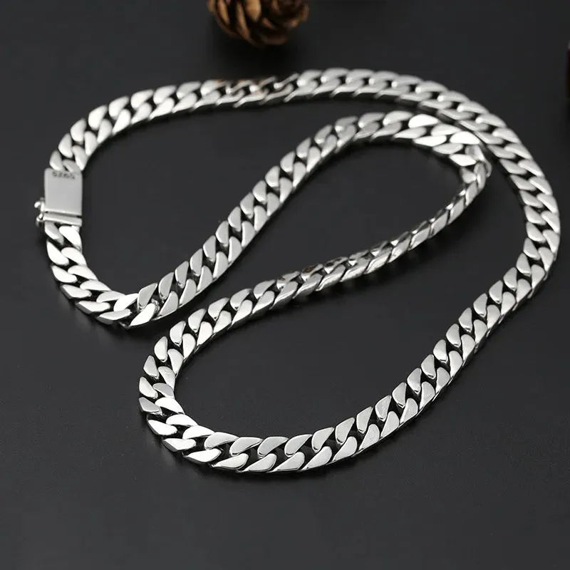 Men's Bracelet Silver with smooth Cuban links designed for casual and formal outfits.