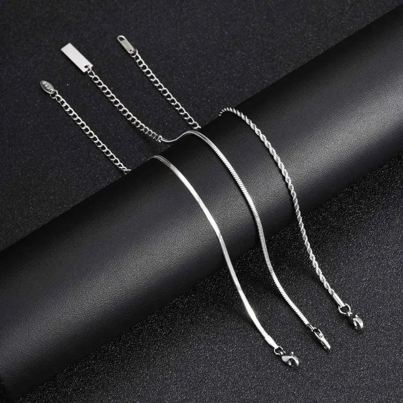 Close-up of the Men's Bracelet Silver showcasing the Trinity Chain Bracelet Set with layered stainless steel chain designs.