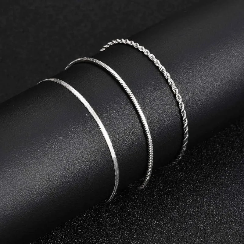 Detailed view of the Trinity Chain Bracelet Set highlighting premium stainless steel craftsmanship and polished finish.