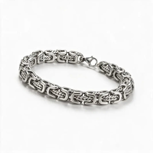 Silver stainless steel byzantine link bracelet product photo on white background